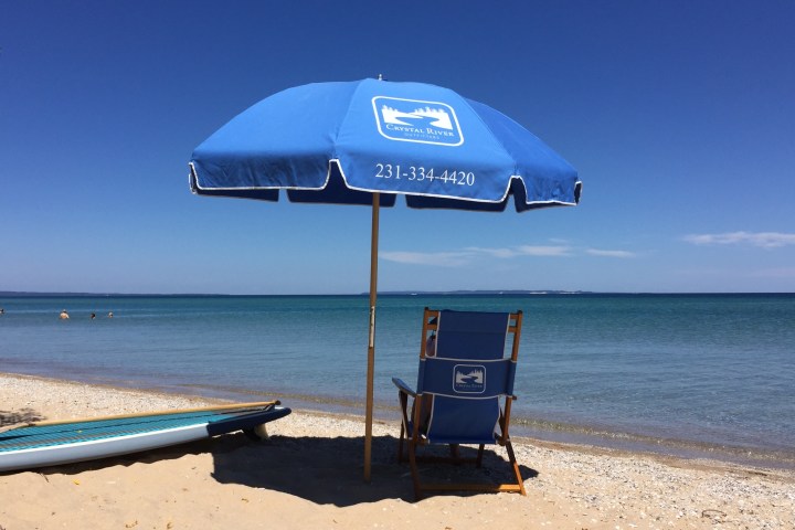 a boat sitting on top of a beach