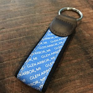 cro-keychain-e1572463644792-1-300×300 a pair of sunglasses on a table