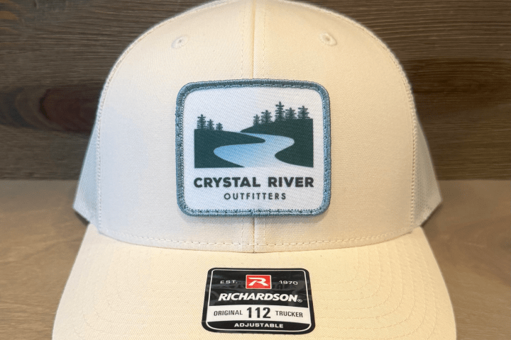 Beige cap with 'Crystal River Outfitters' logo and 'Richardson 112' label.