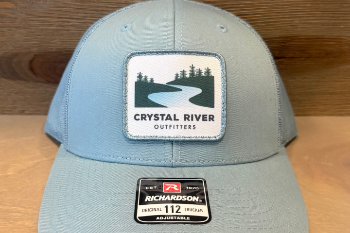 Light blue cap with 'Crystal River Outfitters' logo and adjustable tag.