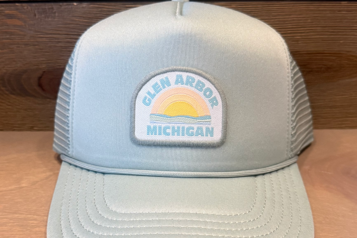 Gray cap with 'Glen Arbor Michigan' patch, featuring a sunset design.